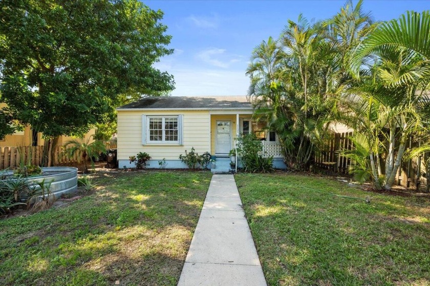 Adorable home with covered porch and quaint picket fence. Key - Beach Home for sale in Lake Worth Beach, Florida on Beachhouse.com