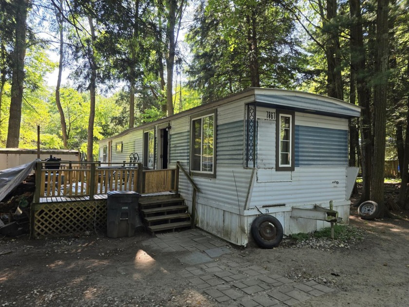 Older 12x60 mobile home in the Holiday Shores development - Beach Home for sale in Shelby, Michigan on Beachhouse.com