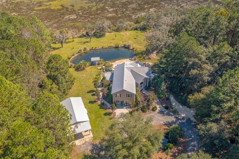 Welcome to your dream home! Nestled on 2.47 picturesque acres - Beach Home for sale in Townsend, Georgia on Beachhouse.com