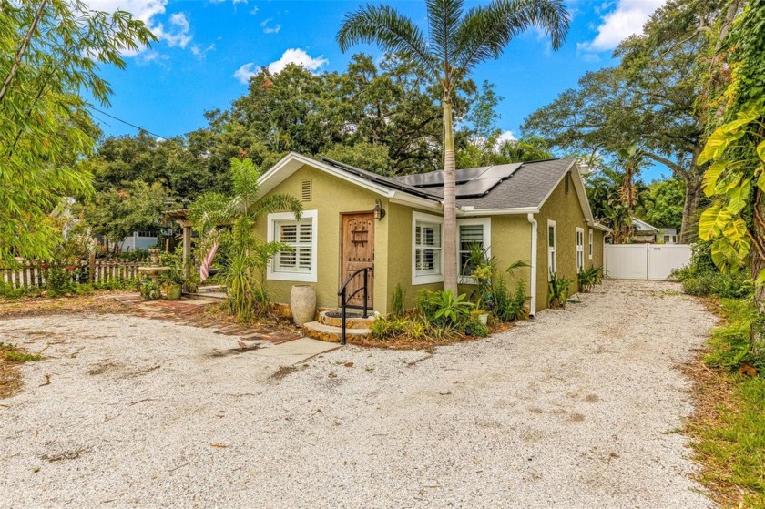 Nestled just a block away from the serene Whitcomb Bayou, this - Beach Home for sale in Tarpon Springs, Florida on Beachhouse.com