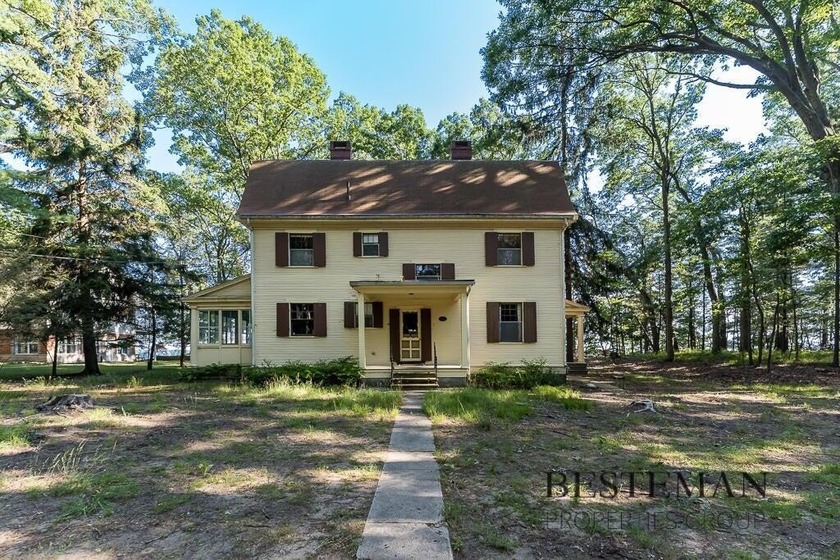 Exquisite opportunity! With over 14 acres and 250 ft of lake - Beach Home for sale in Montague, Michigan on Beachhouse.com