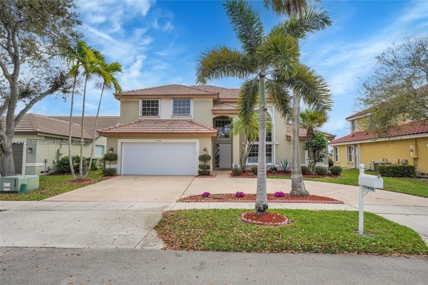 Discover your dream home in the highly sought-after community of - Beach Home for sale in Pembroke Pines, Florida on Beachhouse.com