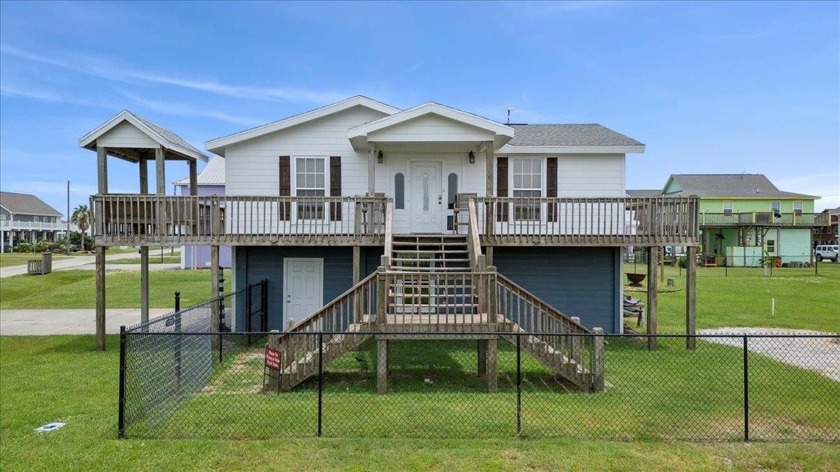 Step into your own private paradise at Crystal Beach! This - Beach Home for sale in Port Bolivar, Texas on Beachhouse.com