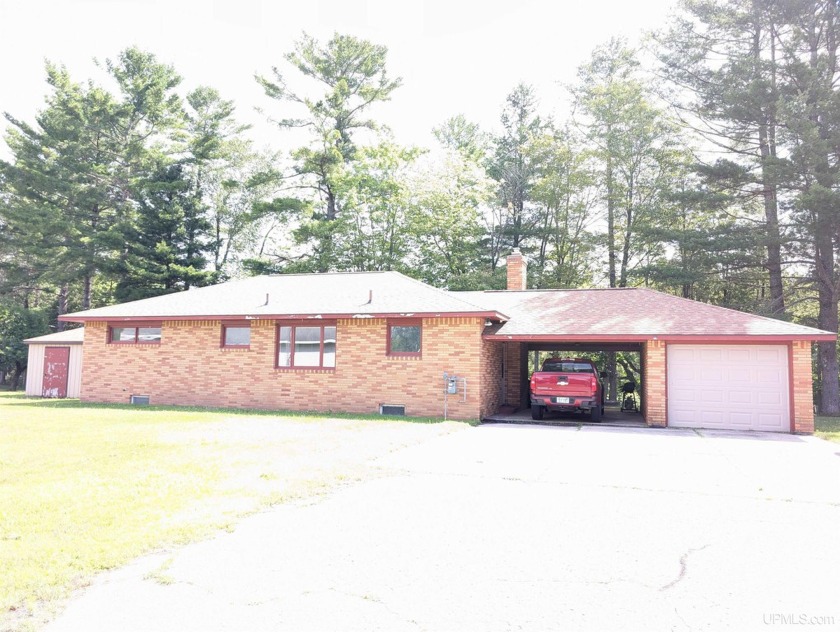 Nestled on the banks of the picturesque Indian River with 170' - Beach Home for sale in Manistique, Michigan on Beachhouse.com