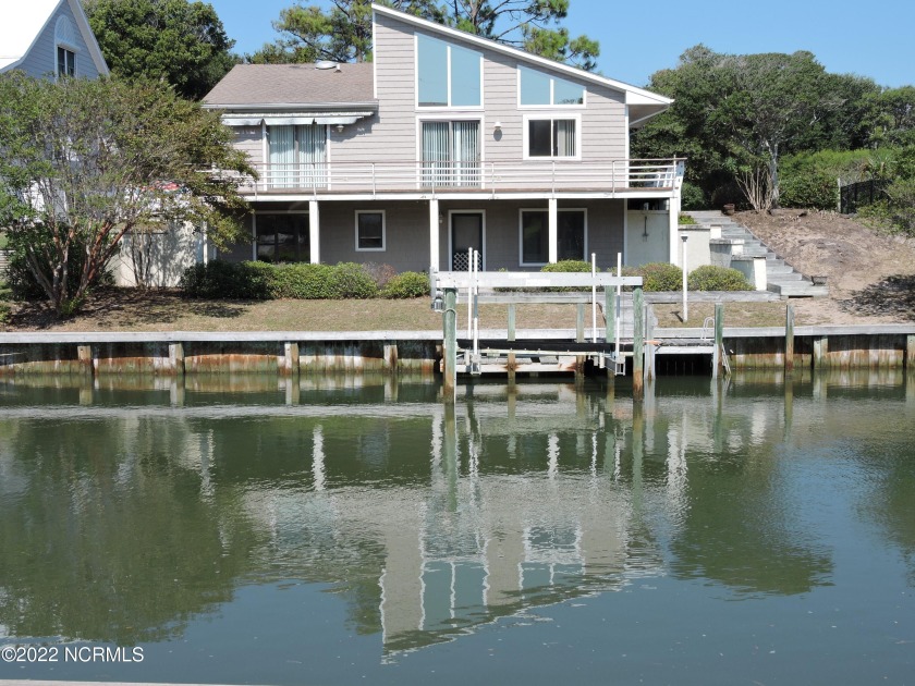 Your chance to live or have a secondary home on the canal in the - Beach Home for sale in Pine Knoll Shores, North Carolina on Beachhouse.com