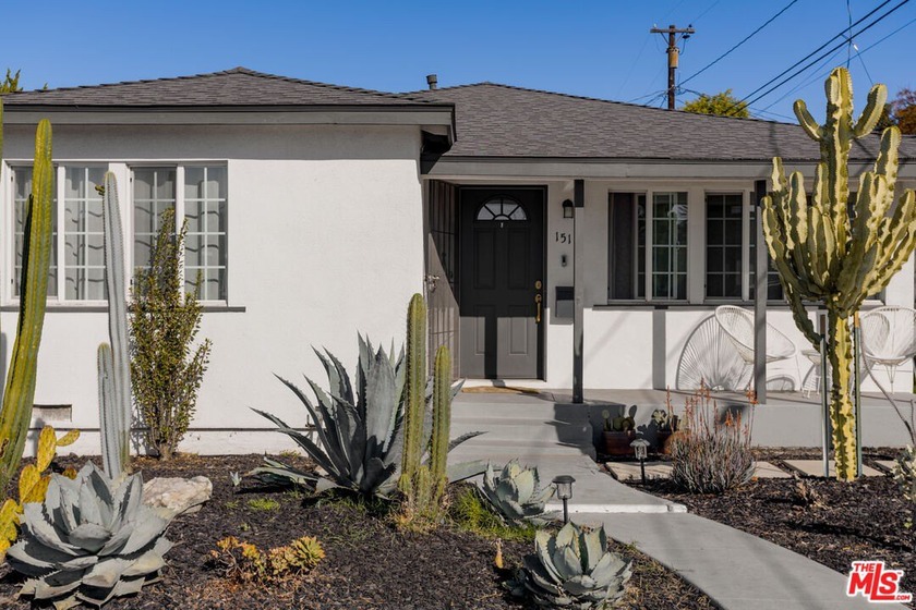 Positioned on a picturesque, tree-canopied street, 1515 E - Beach Home for sale in Long Beach, California on Beachhouse.com