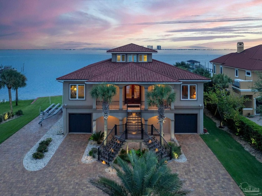 This stunning ICF waterfront home, featuring 135 feet on the - Beach Home for sale in Gulf Breeze, Florida on Beachhouse.com