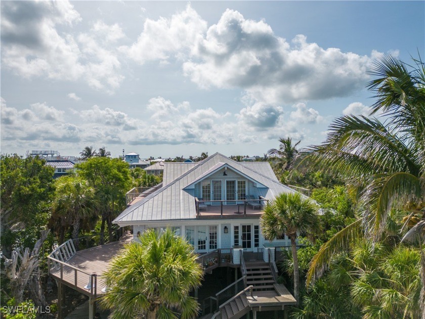 A charming and dreamy beach side home with that New England - Beach Home for sale in Captiva, Florida on Beachhouse.com