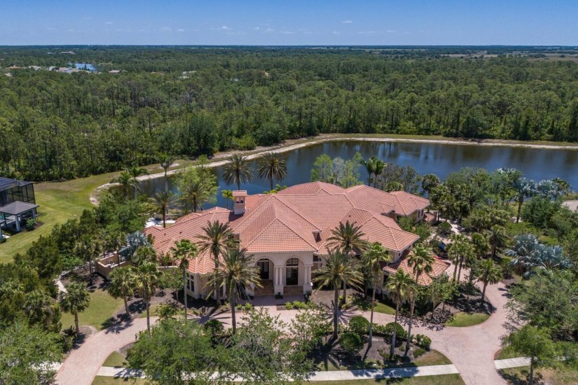 Welcome to 19208 Ganton Avenue in The Concession. Set on over an - Beach Home for sale in Lakewood Ranch, Florida on Beachhouse.com