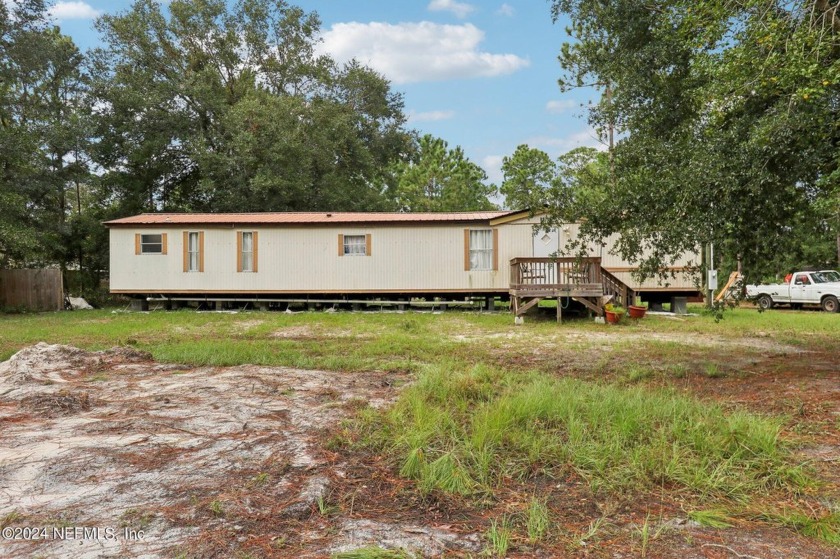 This charming 2-bedroom, 2-bath mobile home offers a peaceful - Beach Home for sale in Fernandina Beach, Florida on Beachhouse.com