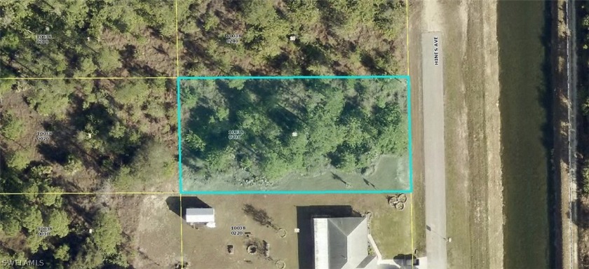 Build your dream home here!  Half acre lot with a water view on - Beach Lot for sale in Lehigh Acres, Florida on Beachhouse.com