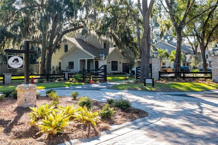 Fifty Oaks is an enclave of 52 luxury townhomes, located North - Beach Townhome/Townhouse for sale in Saint Simons, Georgia on Beachhouse.com