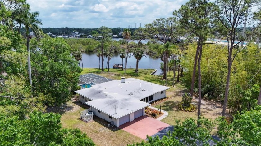 $74,000 price reduction and Investor Alert! Rare Riverfront - Beach Home for sale in Bradenton, Florida on Beachhouse.com