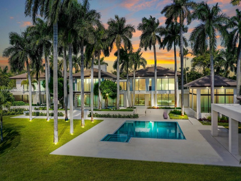 THIS SPECTACULAR ESTATE IN THE EXCLUSIVE GATED COMMUNITY OF - Beach Home for sale in Coral Gables, Florida on Beachhouse.com