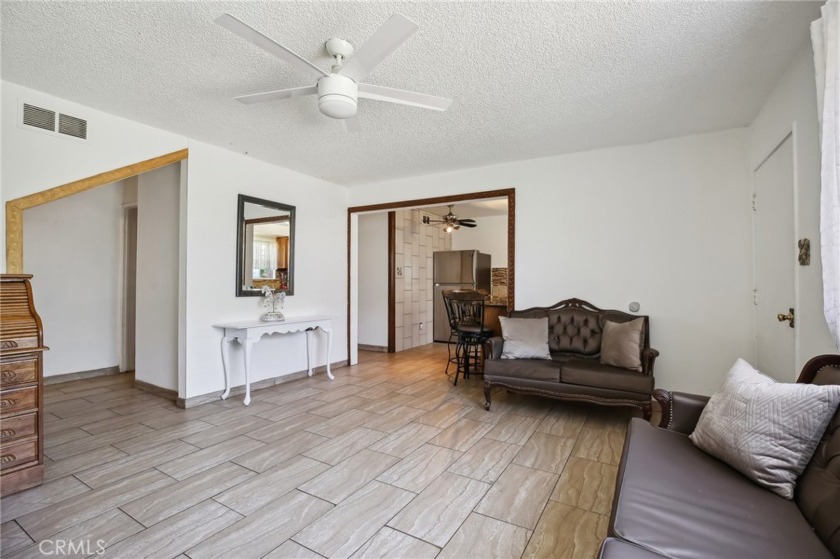 Welcome to this spacious 4-bedroom, 2-bath home in the heart of - Beach Condo for sale in Carson, California on Beachhouse.com