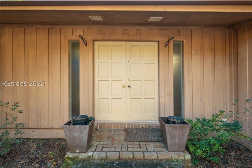 Discover this mid-century modern home in desirable Royal Pines - Beach Home for sale in Beaufort, South Carolina on Beachhouse.com