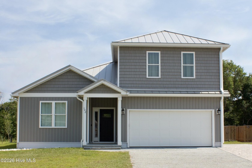 Home is a recent build, like new and fully loaded with/ tons of - Beach Home for sale in Pine Knoll Shores, North Carolina on Beachhouse.com