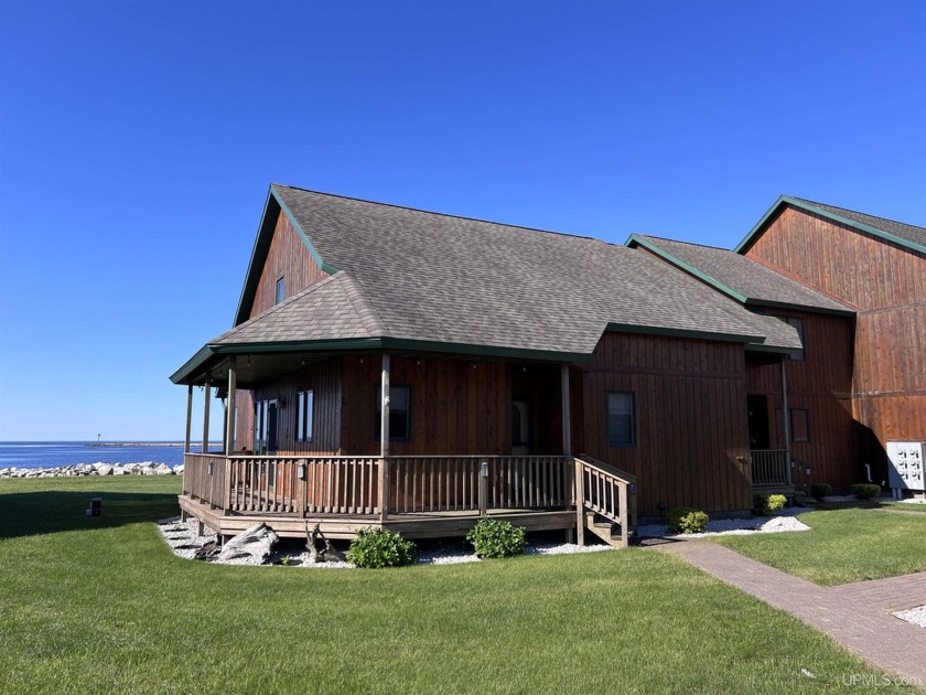 Discover the ultimate in lakeside living with the beautifully - Beach Home for sale in Manistique, Michigan on Beachhouse.com