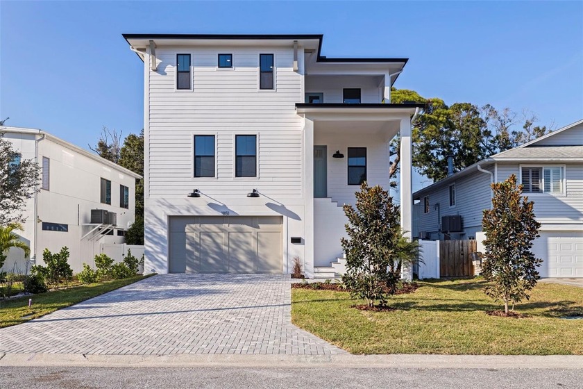 This brand-new modern coastal home offers elevated luxury living - Beach Home for sale in St. Petersburg, Florida on Beachhouse.com