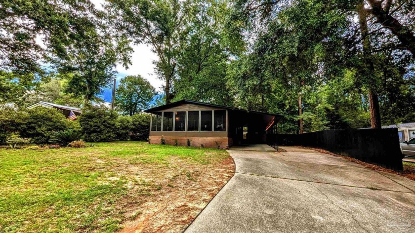 Nestled among lush foliage, this charming 2-bedroom, 2-bathroom - Beach Home for sale in Lillian, Alabama on Beachhouse.com