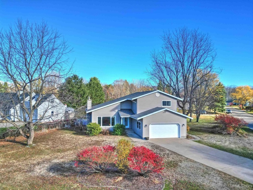 Welcome to this spacious 2-story home in the desirable Specker - Beach Home for sale in Marquette, Michigan on Beachhouse.com