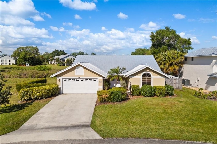 Move-in ready pool home with beautiful lake and fountain views - Beach Home for sale in Stuart, Florida on Beachhouse.com