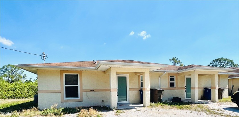 Exceptional income-producing duplex offering 3 bedrooms and 2 - Beach Home for sale in Lehigh Acres, Florida on Beachhouse.com