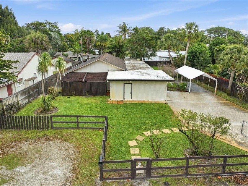 Welcome to this charming residence ideally located in the heart - Beach Home for sale in West Palm Beach, Florida on Beachhouse.com