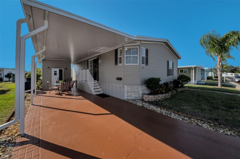 Discover a rare opportunity in the highly desirable Tarpon - Beach Home for sale in Tarpon Springs, Florida on Beachhouse.com