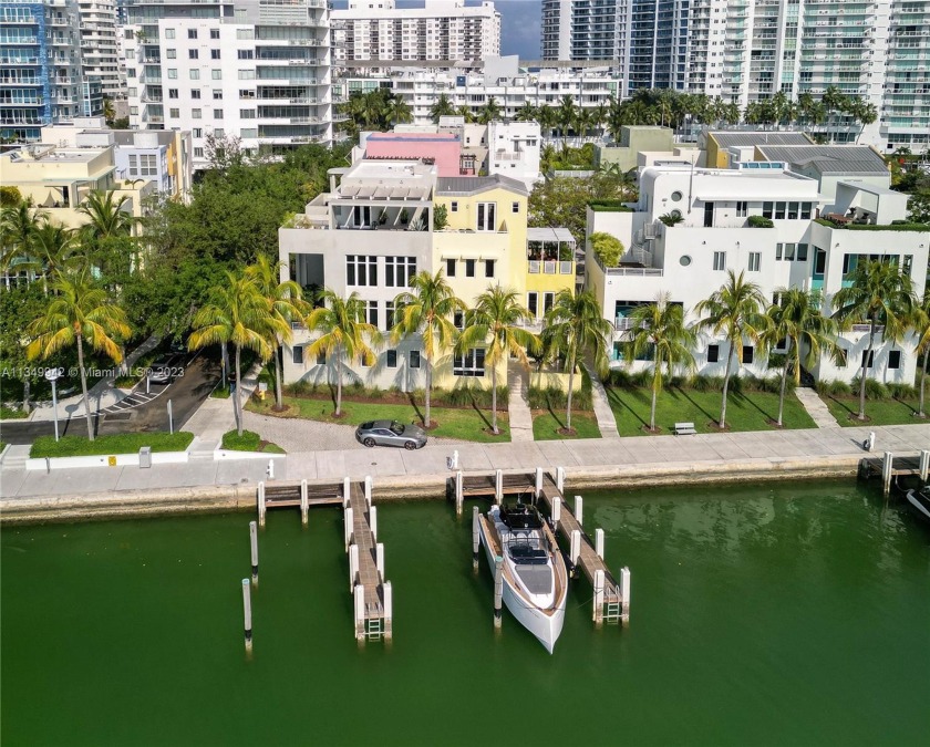 This amazing 4 story waterfront home is being offered with all - Beach Townhome/Townhouse for sale in Miami Beach, Florida on Beachhouse.com