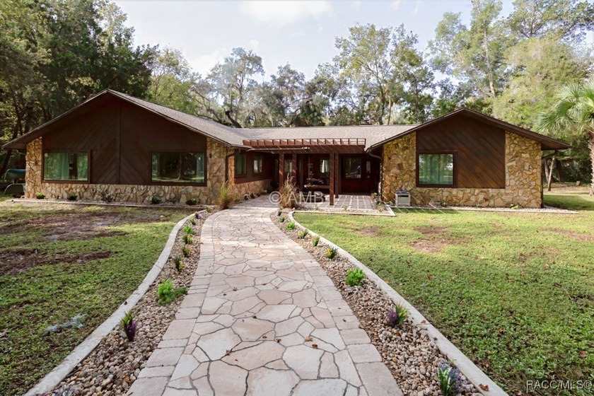 Enjoy rare, expansive waterfront living with 400 feet of direct - Beach Home for sale in Inglis, Florida on Beachhouse.com