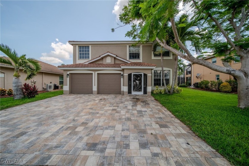 Welcome to this beautiful two-story home located in one of the - Beach Home for sale in Fort Myers, Florida on Beachhouse.com
