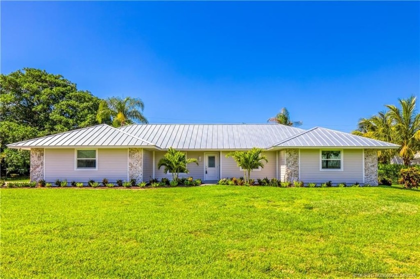 This spacious single story home on half an acre with a fenced - Beach Home for sale in Hobe Sound, Florida on Beachhouse.com