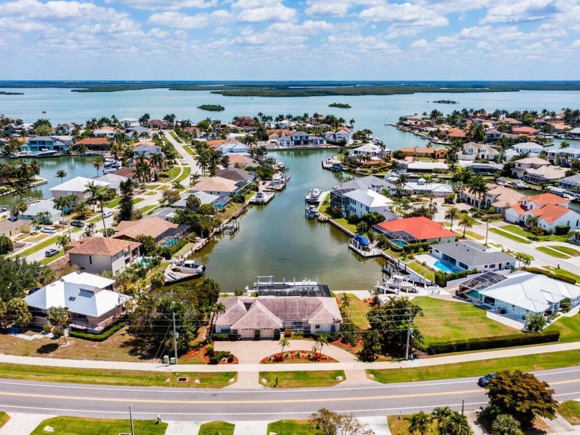 Welcome to this exceptional 5 bedroom, 4 bathroom waterfront - Beach Home for sale in Marco Island, Florida on Beachhouse.com