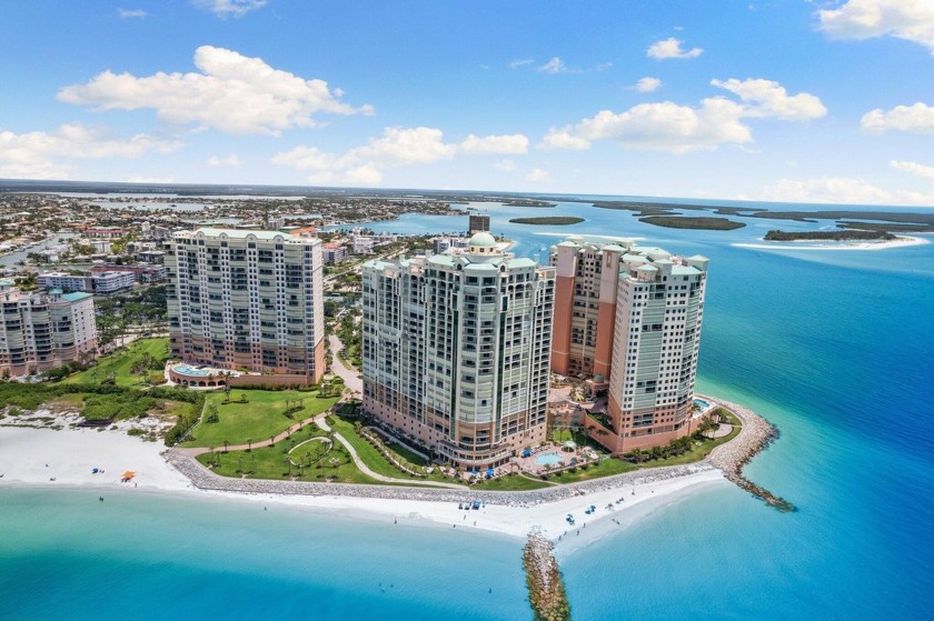 Experience luxury living at its finest in this coastal 3-bed, 3 - Beach Condo for sale in Marco Island, Florida on Beachhouse.com
