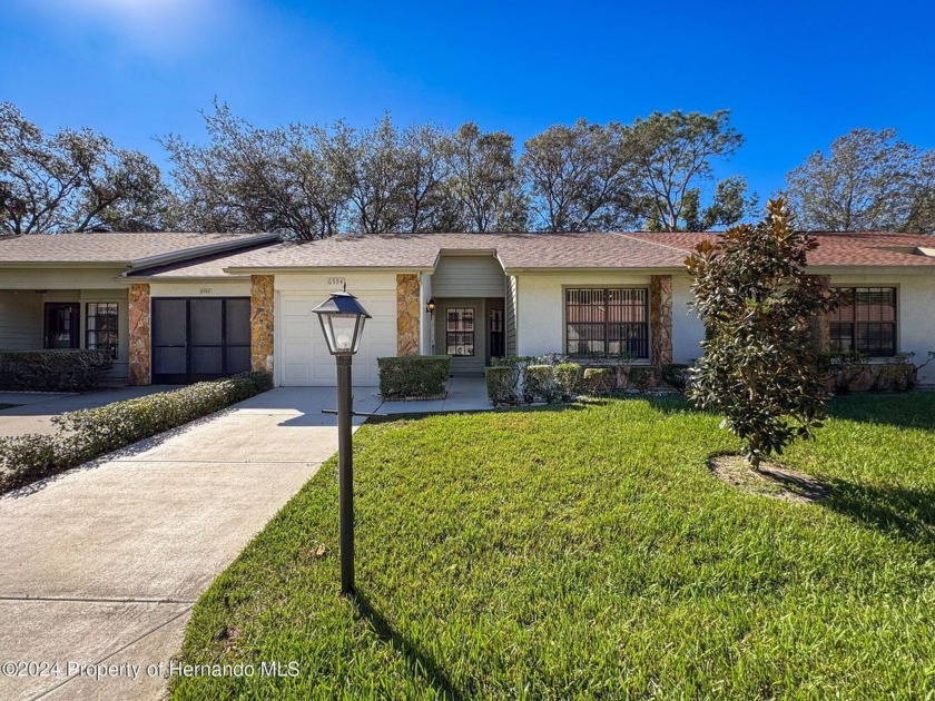 Move in ready 2/2/1 maintained villa in TIMBER PINES! Brand new - Beach Home for sale in Spring Hill, Florida on Beachhouse.com