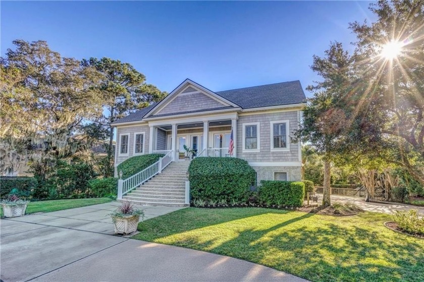 Nestled on a lush .41-acre lot with breathtaking marsh views - Beach Home for sale in Saint Simons, Georgia on Beachhouse.com