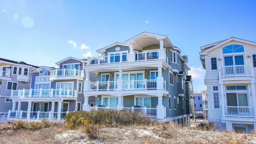 Experience extraordinary beachfront living in this - Beach Home for sale in Sea Isle City, New Jersey on Beachhouse.com