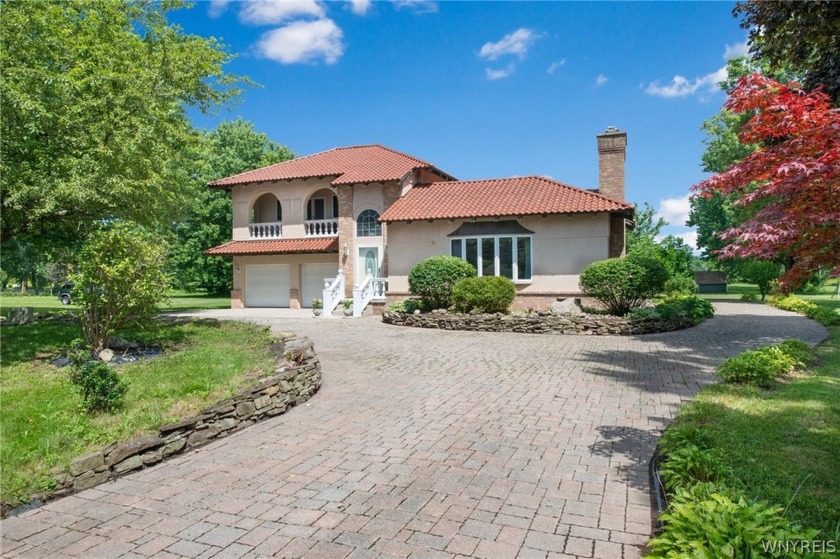 A rare Mediterranean custom home at a level of construction and - Beach Home for sale in Pendleton, New York on Beachhouse.com