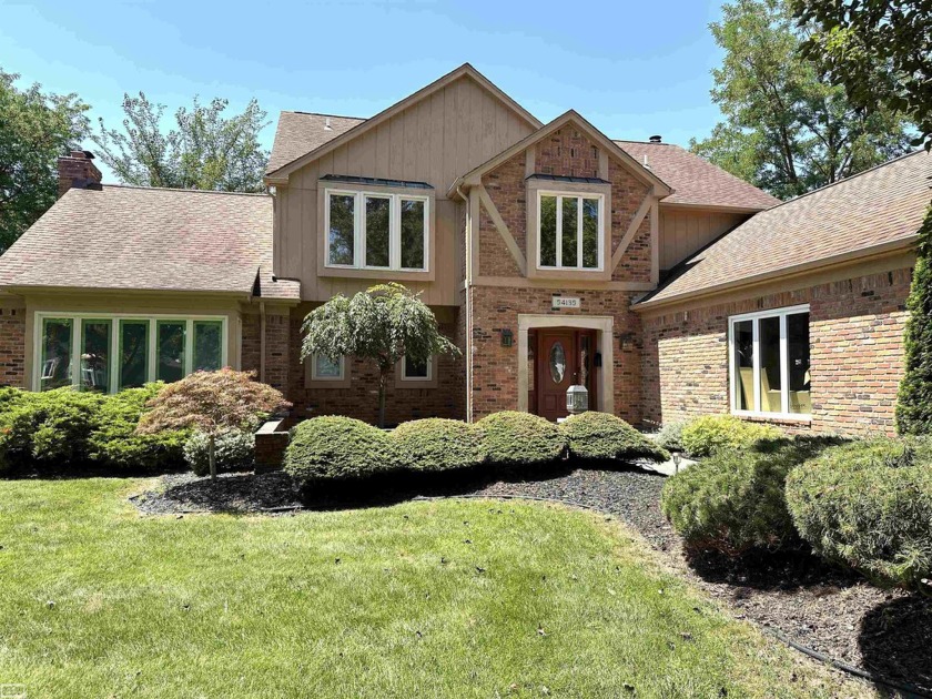 MAGNIFICENT LAKEFRONT CUSTOM BUILT COLONIAL ON SCENIC LAKE - Beach Home for sale in Shelby, Michigan on Beachhouse.com