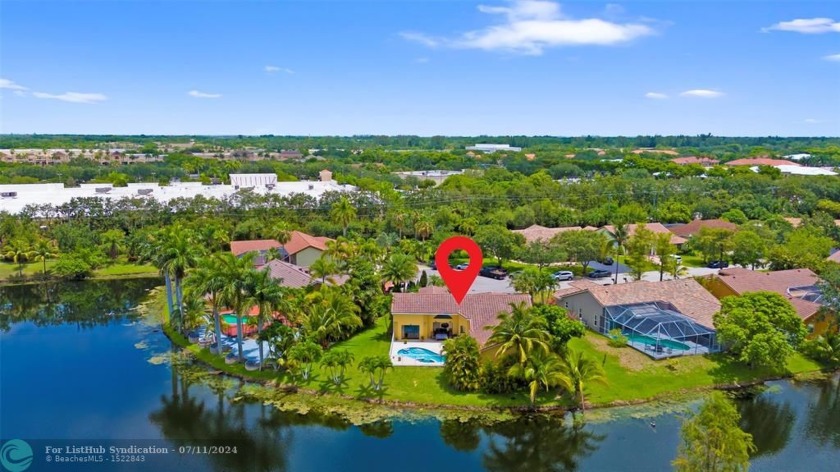 Water Views from the moment you enter this beautifully renovated - Beach Home for sale in Coral Springs, Florida on Beachhouse.com