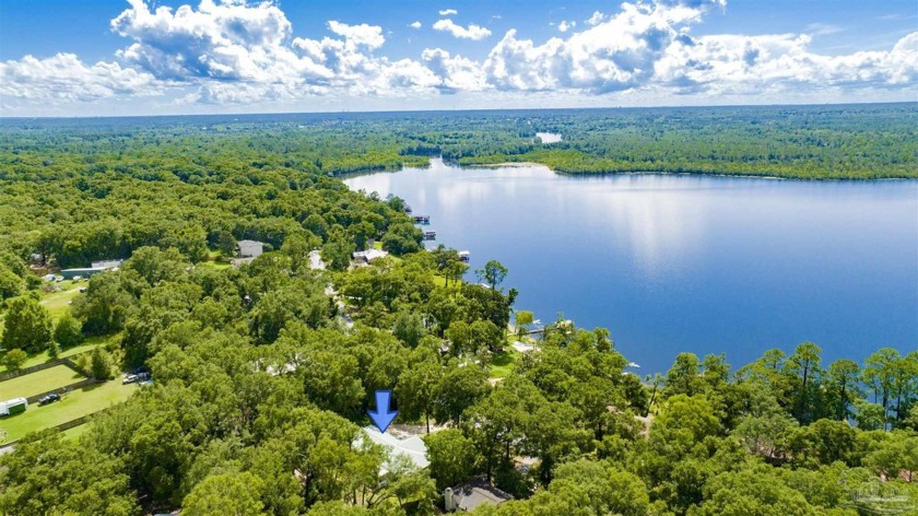 Welcome to this enchanting WATERVIEW brick home located in the - Beach Home for sale in Milton, Florida on Beachhouse.com