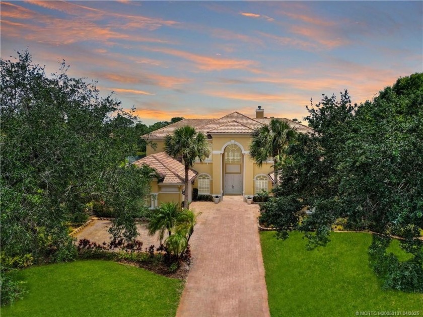 PRIVATE LAKESIDE RETREAT - This updated 5 BR, 6 bath, 4 garage - Beach Home for sale in Palm City, Florida on Beachhouse.com