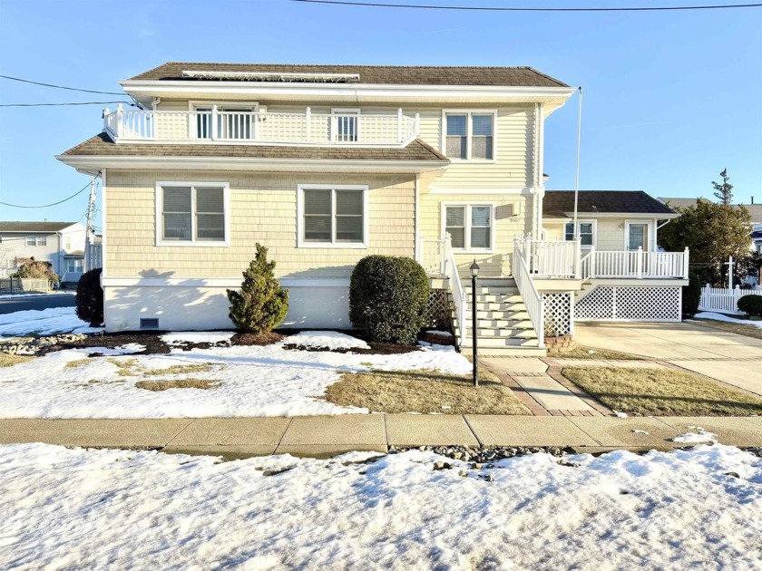 Seize the opportunity to own this exquisite duplex, offering - Beach Townhome/Townhouse for sale in Stone Harbor, New Jersey on Beachhouse.com