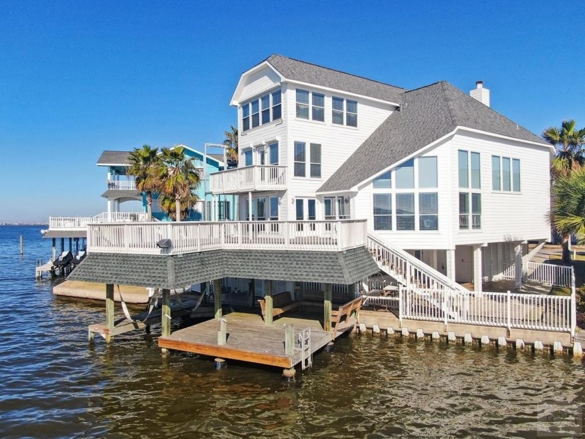 This beautiful Tiki home sets on the bay with gorgeous Tiki - Beach Home for sale in Tiki Island, Texas on Beachhouse.com