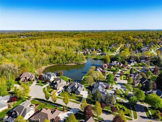 This stunning all-brick Cape Cod is tucked away on a quiet - Beach Home for sale in Shelby, Michigan on Beachhouse.com