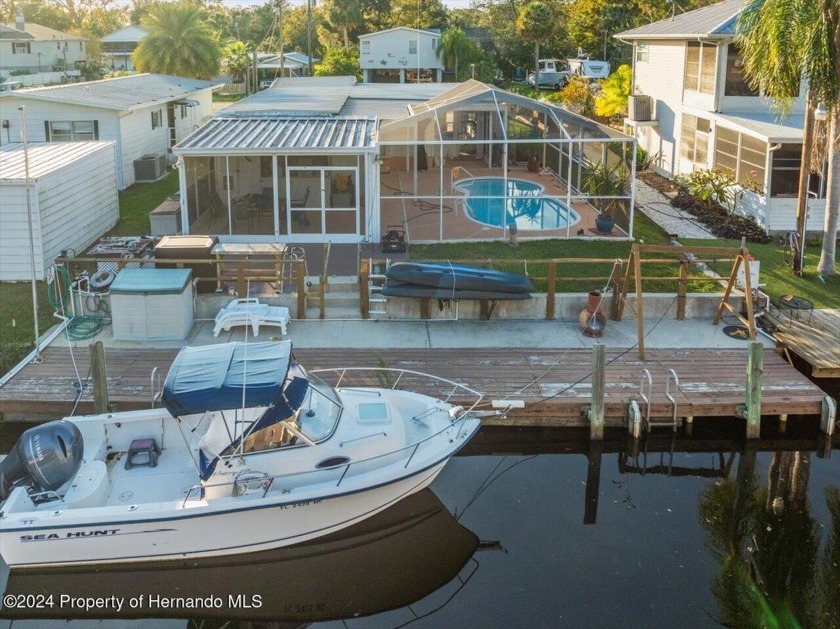 Screened Inground Pool Waterfront in the Weeki Wachee! Discover - Beach Home for sale in Weeki Wachee, Florida on Beachhouse.com