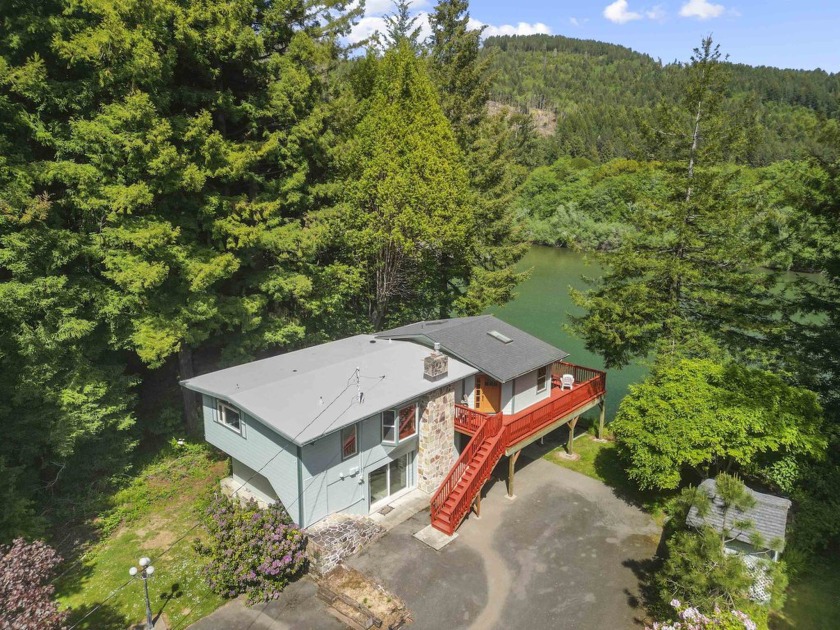 Nestled along the breathtaking Smith River, this exceptional - Beach Home for sale in Crescent City, California on Beachhouse.com