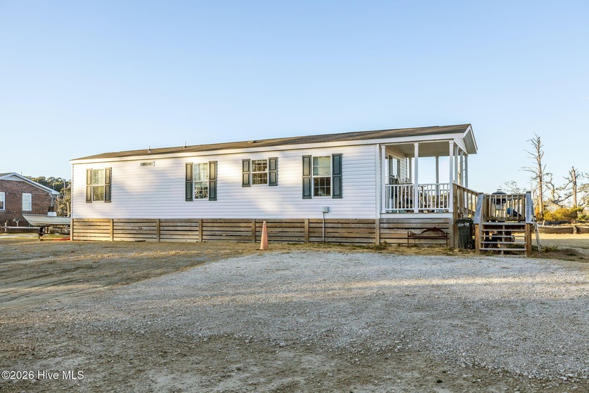 DEEDED WATER ACCESS! A true rarity, deeded access to a private - Beach Home for sale in Smyrna, North Carolina on Beachhouse.com