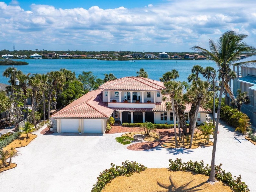 This captivating Gulf-to-Bay residence ideally embodies timeless - Beach Home for sale in Nokomis, Florida on Beachhouse.com